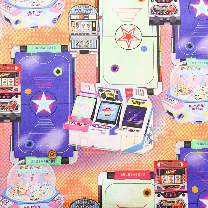 コットンシーチングプリント生地 nora. ゲームセンター