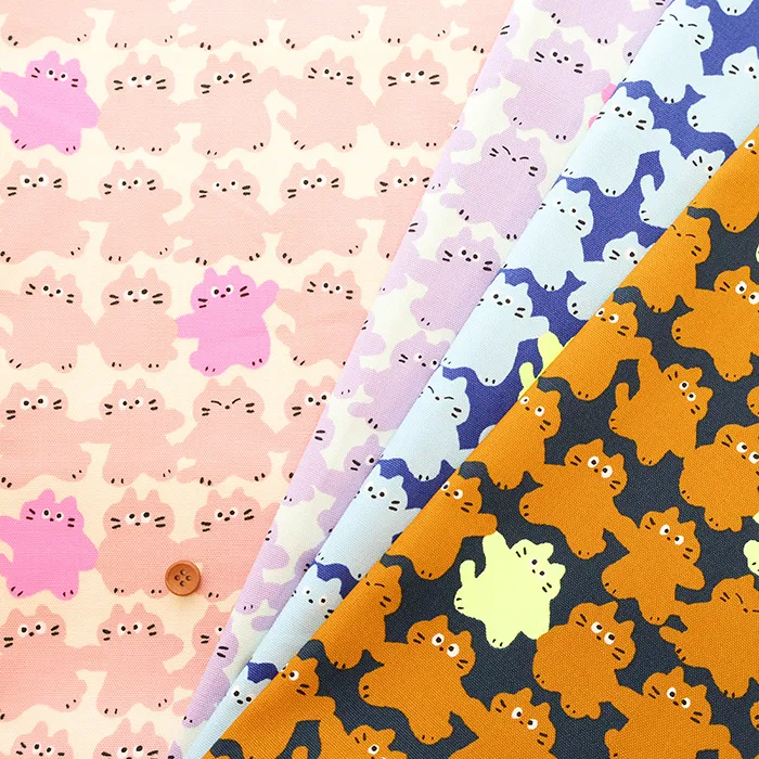 コットンオックスネオンプリント生地 メロウフレンズ ネコ