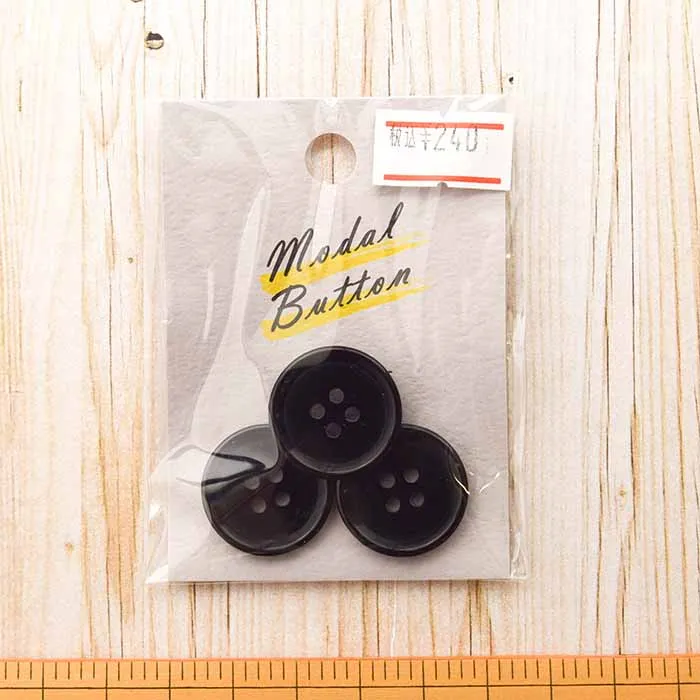 4つ穴ポリエステルボタン 21mm