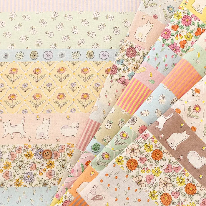 コットンシーチングプリント生地 Shanti Garden Catボーダー